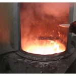 Burning off dirt in casting pot
