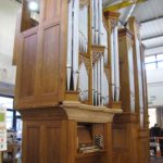 organ being erected in workshop
