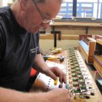 David Robinson working on the Great Reeds soundboard wellington
